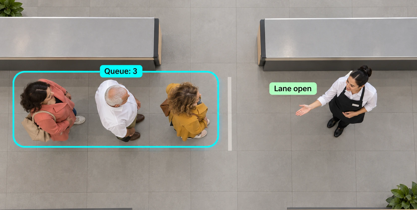 Three shoppers inside a queue boundary as an employee opens another lane